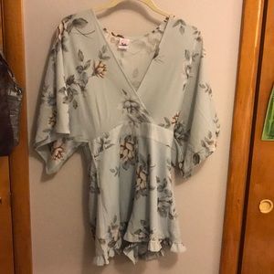 Size medium. light blue floral Romper.